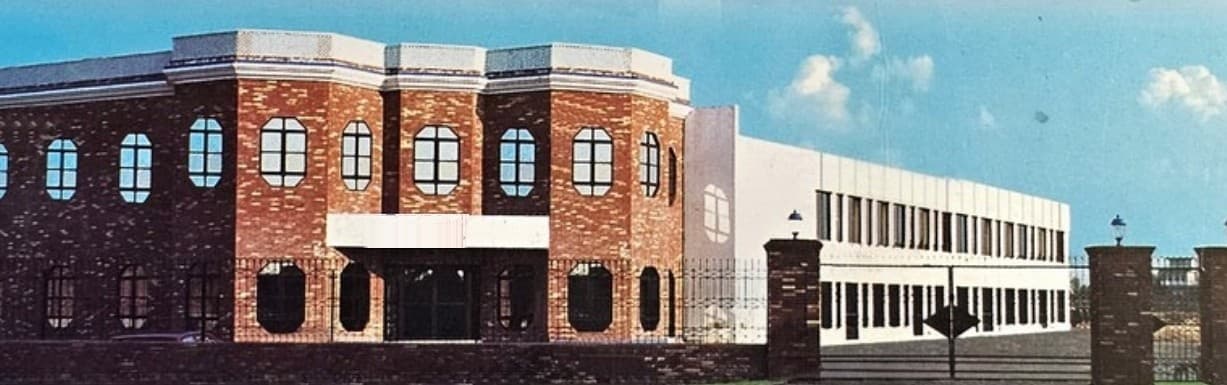 The family's original dental instrument company headquarters, founded 1984